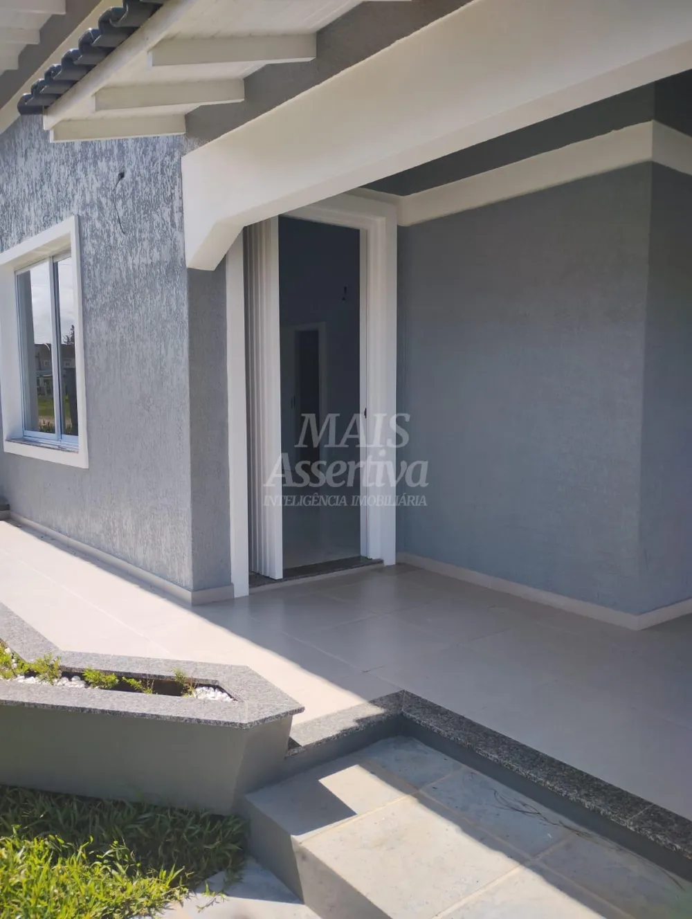 Excelente casa a venda em Tramandaí - 3 dormitórios, 2 vagas de garagem