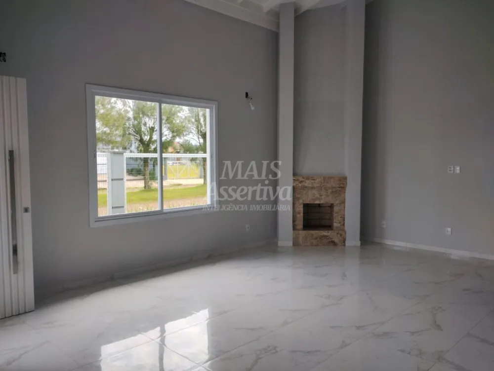 Excelente casa a venda em Tramandaí - 3 dormitórios, 2 vagas de garagem