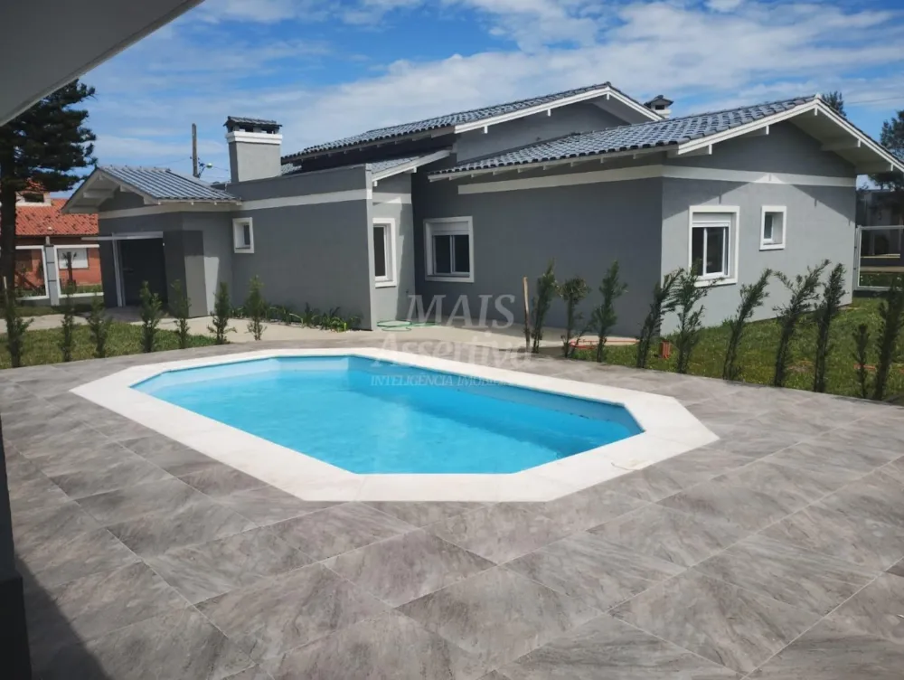 Excelente casa a venda em Tramandaí - 3 dormitórios, 2 vagas de garagem