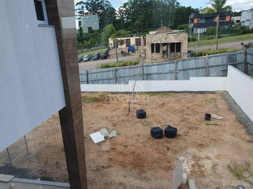 Excelente sobrado de alto padrão em Alphaville, Residencial Lombardia - POA