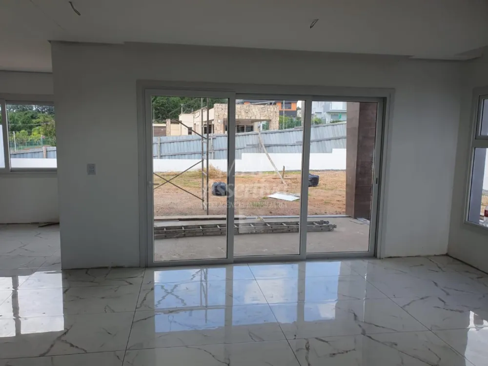 Excelente sobrado de alto padrão em Alphaville, Residencial Lombardia - POA