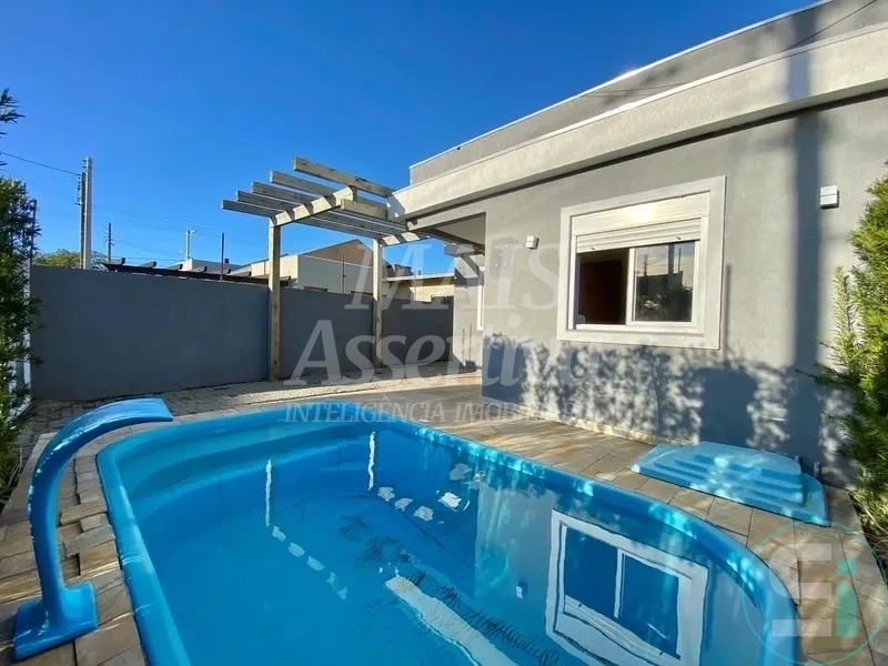 Casa com piscina para venda em Capão da Canoa