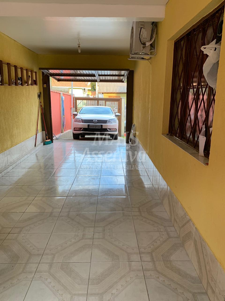 Casa a venda no bairro Jardim Algarve em Alvorada/RS - 2 dormitórios