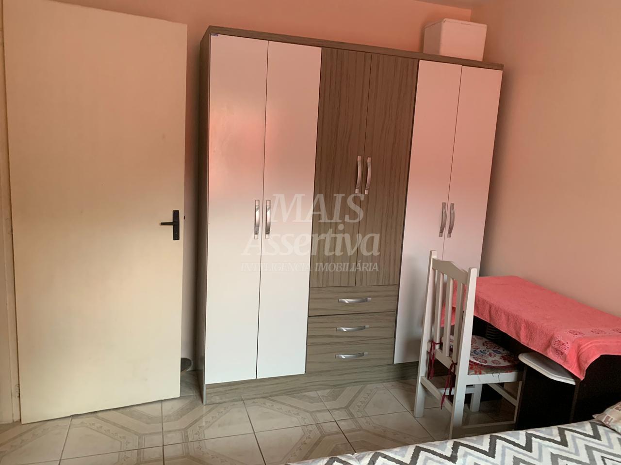 Casa a venda no bairro Jardim Algarve em Alvorada/RS - 2 dormitórios